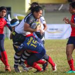 Aksi pemain ragbi wanita Terengganu; Lorna Cassandra William(tiga dari kiri) sewaktu menentang pasukan Johor dalam perlawanan pertama bagi kedua-dua pasukan di pentas temasya Sukan Malaysia(SUKMA) Perak 2018. Kredit Foto - Sekretariat SUKMA Perak 2018